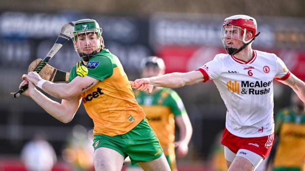 Josh Cronolly McGee, Donegal, and Fionn Devlin, Tyrone, in Allianz Hurling League action. Photo by Ben McShane/Sportsfile