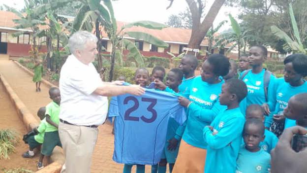 Irish Ambassador to Uganda, Kevin Colgan, pictured with the Nile Óg Cusacks players. 