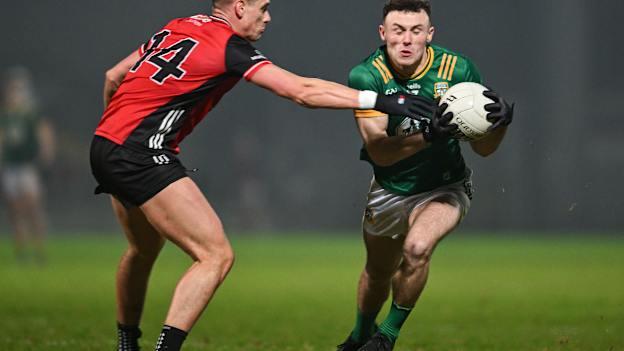 Jordan Morris, Meath, and Pat Havern, Down, in Allianz Football League Division Two action at Páirc Esler. Photo by Stephen Marken/Sportsfile