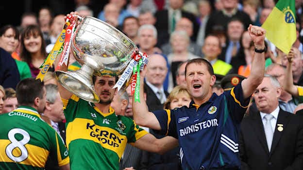 Paul Galvin and Jack O'Connor lift the Sam Maguire Cup in 2009. Photo by Stephen McCarthy/Sportsfile
