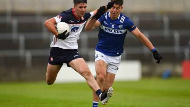 Shane Brosnan of New York is tackled by Seamus Lacey of Laois during the Tailteann Cup preliminary quarter-final match between Laois and New York at Laois Hire O'Moore Park in Portlaoise, Laois. Photo by Tom Beary/Sportsfile.