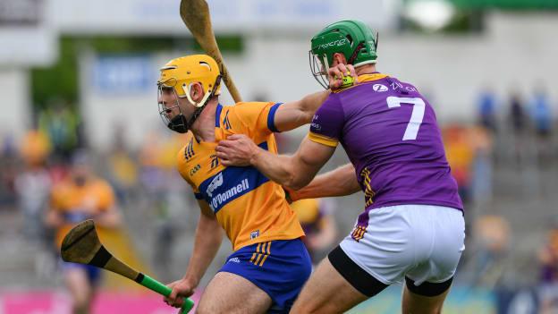 Mark Rodgers, Clare, and Matthew O'Hanlon, Wexford, in All-Ireland SHC Quarter-Final action at FBD Semple Stadium. Photo by Ray McManus/Sportsfile
