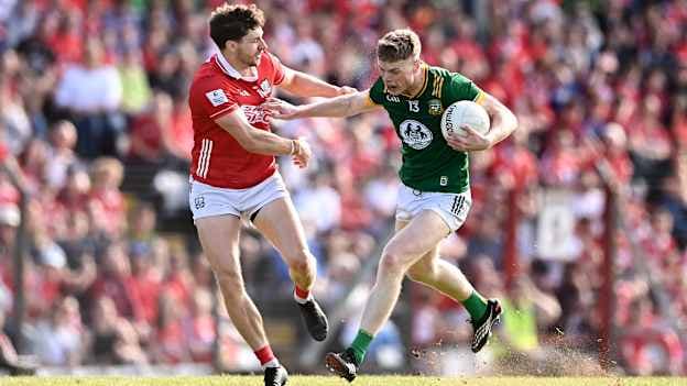 Mathew Costello, Meath, and Paul Walsh, Cork, in All-Ireland SFC Round One action. Photo by Ben McShane/Sportsfile