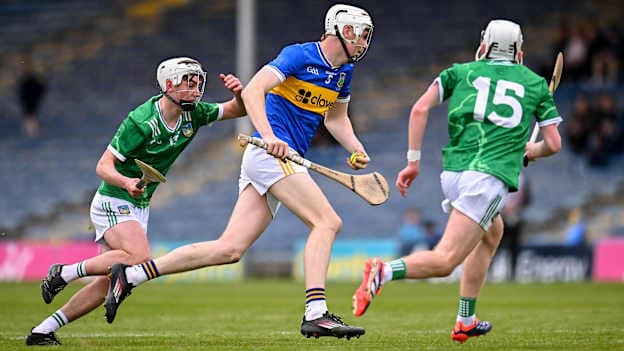 Oisín Kennedy, Tipperary, and Eamon O'Sullivan and Daire Long, Limerick, in Electric Ireland Munster MHC Final action. Photo by Piaras Ó Mídheach/Sportsfile