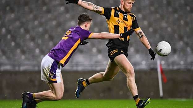 Luke Loughlin, The Downs, and Michael Mullin, Kilmacud Crokes, in action during the 2022 AIB Leinster Club SFC Final at Croke Park.  Photo by Piaras Ó Mídheach/Sportsfile