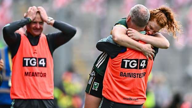 Kerry's Louise Ní Mhuircheartaigh celebrates with Declan Quill and Darragh Long, left, looks on following the 2024 All-Ireland Ladies Football Final at Croke Park. Photo by Piaras Ó Mídheach/Sportsfile