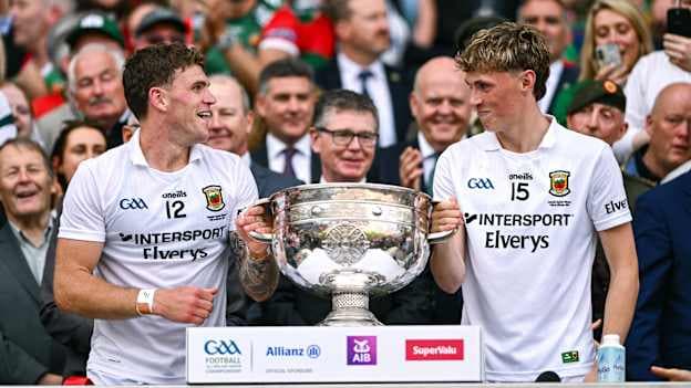 Jordan Flynn, left, and Kobe McDonald of Mayo prepare to lift the Sam Maguire Cup after the GAA Football All-Ireland Senior Championship final match between Kerry and Mayo at Croke Park in Dublin. Photo by Ben McShane/Sportsfile.
