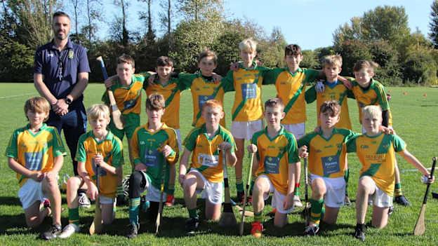 Coach Paul Donoghue with some of the Faughs players, who will make history with their visit to London this weekend.