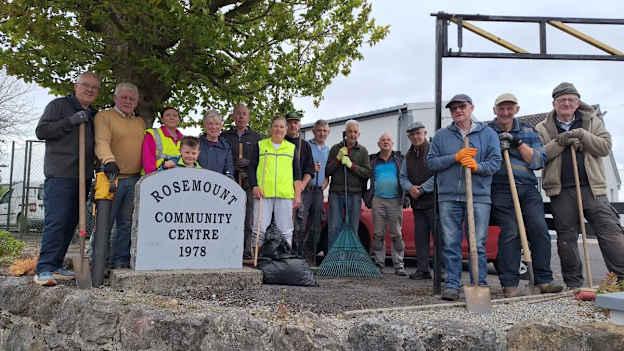 Many hands make light work in Rosemount GAA club. 