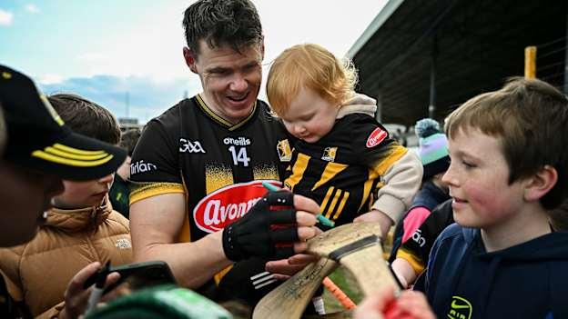 TJ Reid of Kilkenny, accompanied by his daughter Harper Reid, aged 2, signs autographs for supporters after the Allianz Hurling League Division 1A match between Kilkenny and Limerick at UPMC Nowlan Park in Kilkenny. Photo by Sam Barnes/Sportsfile.