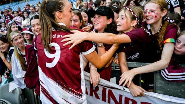 Carrie Dolan of Galway celebrates with members of Clarinbridge Camogie Club after the Glen Dimplex All-Ireland Senior Camogie Championship final match between Cork and Galway at Croke Park in Dublin. Photo by Ramsey Cardy/Sportsfile.