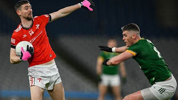 Ciaran Downey, Louth, and Bryan Menton, Meath, in Allianz Football League action. Photo by Ray McManus/Sportsfile