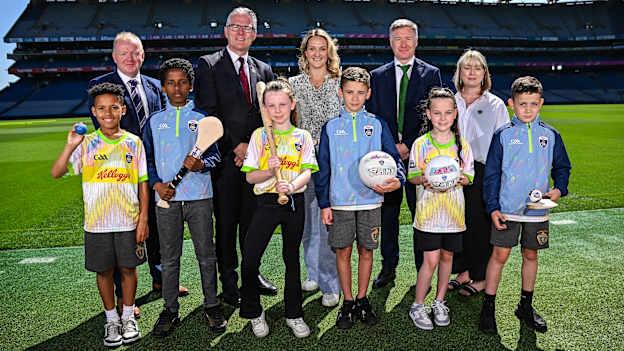 In attendance at the GAA Cúl Camps Partnership with the Department of Education and Youth and the Tusla Education Support Services (TESS) Announcement at Croke Park in Dublin are, back row from left, Games Development Committee Chairperson Micheál Martin, Uachtarán Chumann Lúthchleas Gael Jarlath Burns, Minister for Education and Youth Helen McEntee TD, GAA Director of Games Development Shane Flanagan, and Tusla Education Support Service Director Áine O'Keeffe, with pupils from O'Connell's Primary School, front row from left, Isaiah Ogorro, Ayub Ali, Kaydi Rae Shannon, Ivan Egan, Dezara Grouse and Leroy Ward. Photo by Seb Daly/Sportsfile