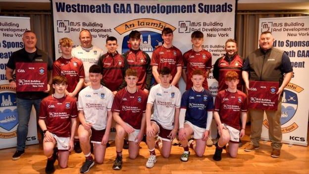 James (back, left) and Michael Stones (back, right) of MJS Building and Development, sponsors of Westmeath development squads, with members of the Westmeath under 16 hurling side.
