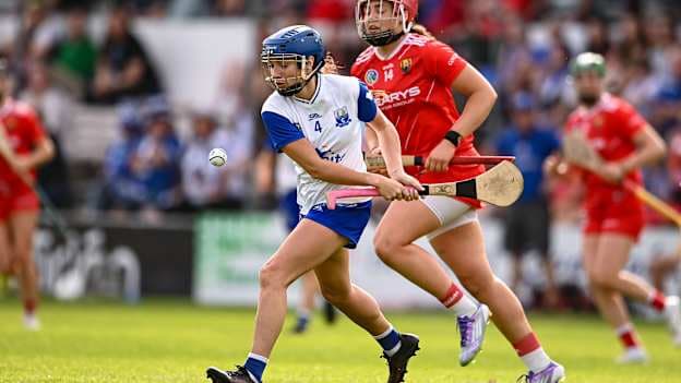 Vikki Falconer of Waterford in action against Sorcha McCartan of Cork during the 2025 Glen Dimplex All-Ireland Camogie Senior Championship semi-final match between Cork and Waterford at UPMC Nowlan Park, Kilkenny. Photo by Ben McShane/Sportsfile.