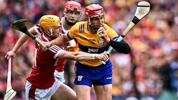 John Conlon of Clare in action against Shane Barrett of Cork during the GAA Hurling All-Ireland Senior Championship Final between Clare and Cork at Croke Park in Dublin. Photo by Piaras Ó Mídheach/Sportsfile.