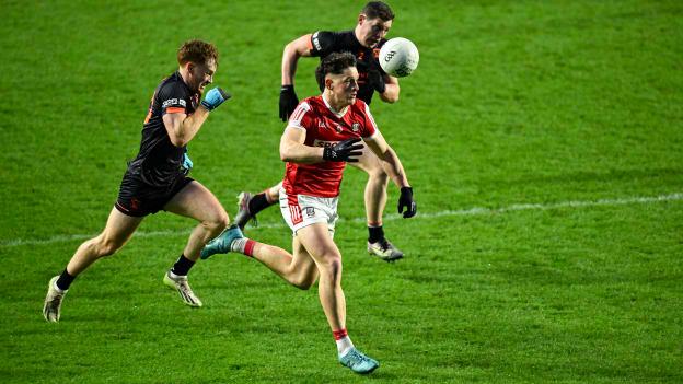 Colm O'Callaghan, Cork, and Armagh's Jason Duffy and Paddy Burns in Allianz Football League action. Photo by Brendan Moran/Sportsfile