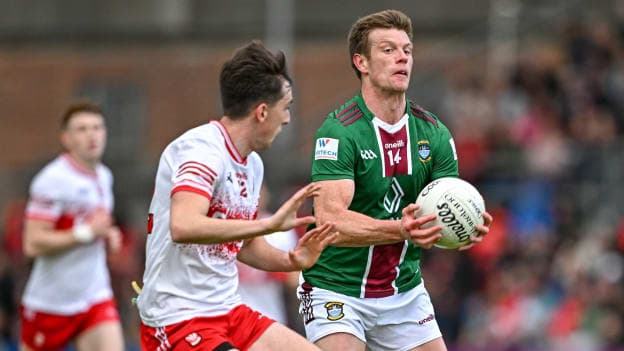 John Heslin, Westmeath, and Paul Cassidy, Derry, in All-Ireland SFC action. Photo by Sam Barnes/Sportsfile
