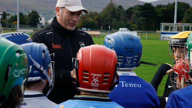 Tipperary senior hurling manager Liam Cahill talks to juvenile Warrenpoint players on Saturday.