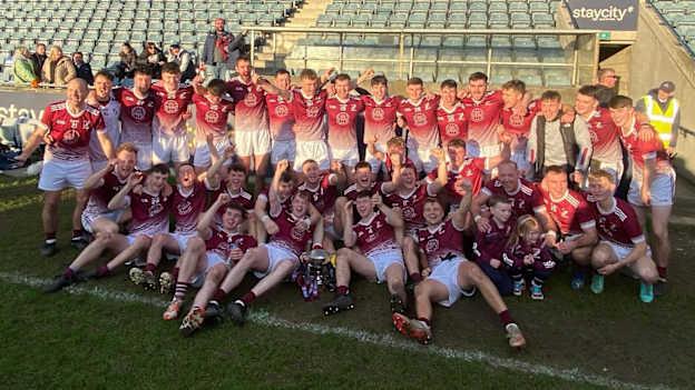 The Caragh players celebrate after their AIB Intermediate Club Football Final victory over Naomh Mearnóg. 