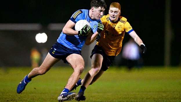 Barry McNulty of UCD in action against Conor Dolan of DCU Dóchas Éireann during the Electric Ireland Higher Education GAA Sigerson Cup Round 2 match between UCD and DCU at Billings Park in Belfield, Dublin. Photo by Ben McShane/Sportsfile.