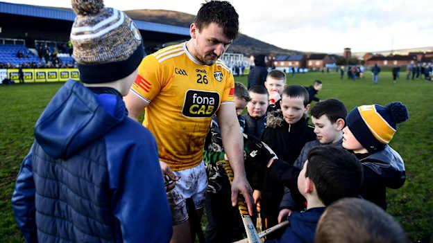 Domhnall Nugent of Antrim signs hurls for young supporters after the Allianz Hurling League Division 1 Group B match between Antrim and Dublin at Corrigan Park in Belfast. Photo by Ben McShane/Sportsfile.