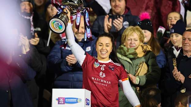 Dervla Higgins lifts the cup for Athenry after victory over St. Finbarr's in the AIB All-Ireland Senior Club Camogie Final. 