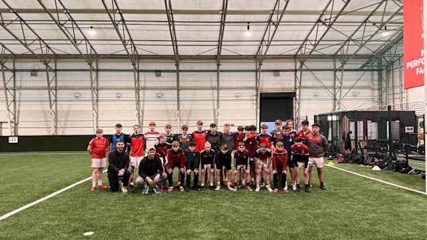 St. Oliver's Community School GAA Development Coach, Ciaran Downey, pictured with some of the school's footballers. 