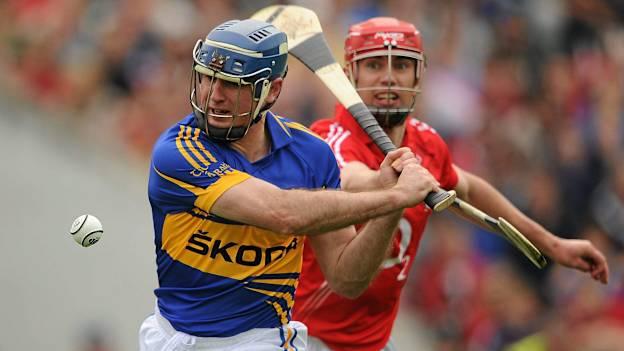 Eoin Kelly, Tipperary, shoots to score his side's second goal despite the efforts of Brian Murphy, Cork, in the 2011 Munster GAA Hurling Senior Championship, Quarter-Final, Tipperary v Cork, Semple Stadium, Thurles, Co. Tipperary. Picture credit: Stephen McCarthy / SPORTSFILE