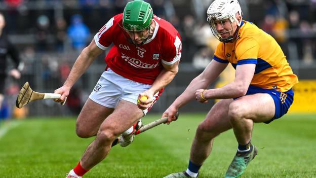 Robbie O'Flynn, Cork, and Adam Hogan, Clare, in Allianz Hurling League action. Photo by Ray McManus/Sportsfile