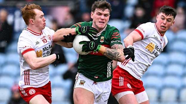Jordan Flynn, Mayo, and Seánie O'Donnell and Liam Gray, Tyrone, in Allianz Football League Division One action at Hastings Insurance MacHale Park. Photo by Piaras Ó Mídheach/Sportsfile