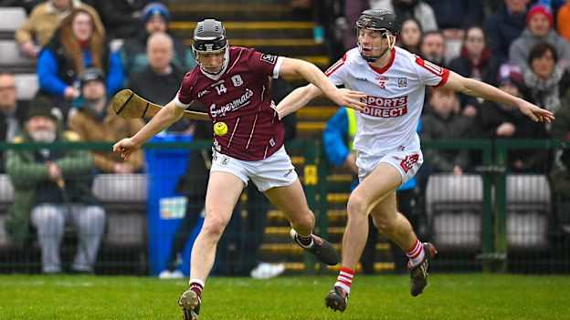 Kevin Cooney, Galway, and Eoin Downey, Cork, in Allianz Hurling League action in 2023. Photo by Seb Daly/Sportsfile