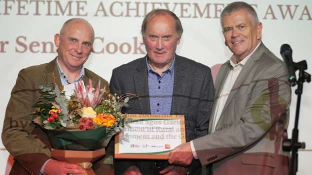 Senan Cooke, centre, pictured being presented with a Lifetime Achievement Award in October 2025 at Ireland's first National Social Enterprise Awards. He was recognized for his decades-long commitment to community development and social enterprise.
