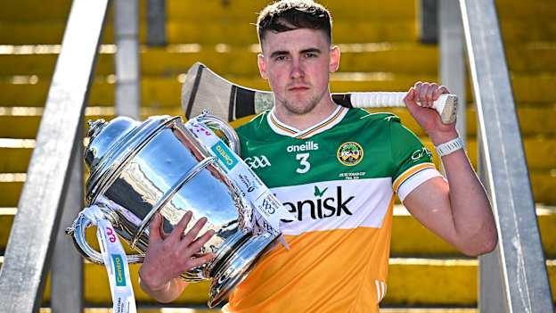 Offaly hurler Ciarán Burke poses for a portrait with the Bob O'Keeffe Cup at the launch of the 2025 Leinster GAA Senior Hurling Championship at UPMC Nowlan Park in Kilkenny. Photo by Sam Barnes/Sportsfile.