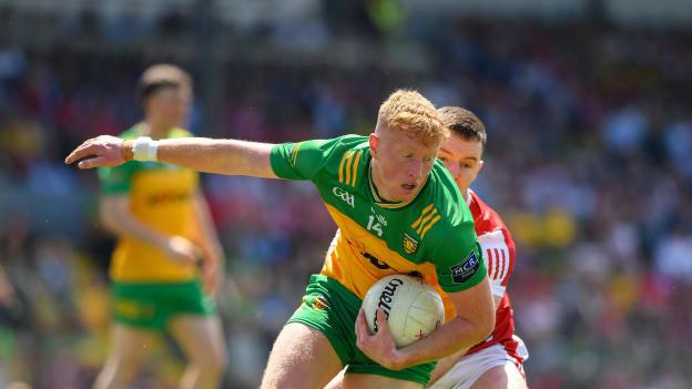 Oisin Gallen, Donegal, and Maurice Shanley, Cork, in All-Ireland SFC action. Photo by Matt Browne/Sportsfile
