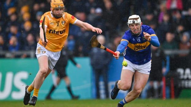 Sean Ryan, Tipperary, and Phelim Duffin, Antrim, in Allianz Hurling League action. Photo by Ramsey Cardy/Sportsfile