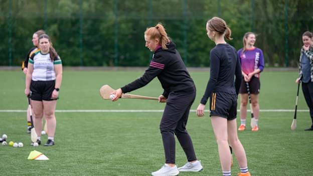 Galway's Áine Keane passing on her knowledge to some apt pupils. 