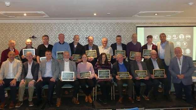 Members of the organising committee for the event held to commemorate the centenary of Offaly's first All-Ireland title last Saturday night, pictured with some relatives of the players on the panel.