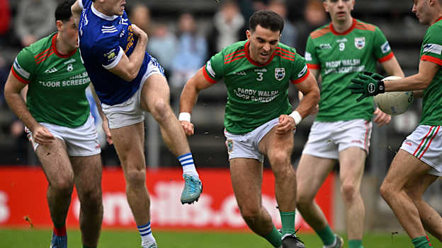 Jordan Morris, Kingscourt Stars, has a shot on goal blocked by Gowna's Fionnan Brady, while under pressure from Ryan McGahern in the Cavan SFC Final. Photo by Sam Barnes/Sportsfile