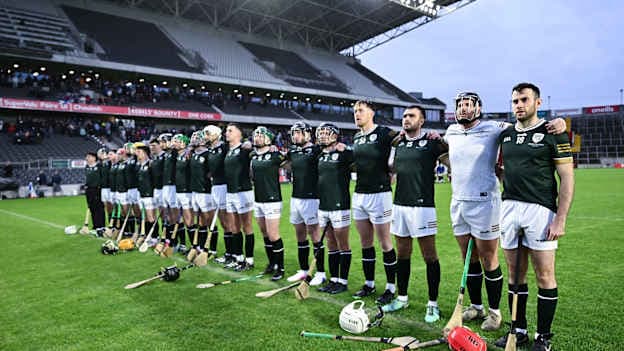 Ireland players stand for Amhrán na bhFiann before the 2026 Hurling/Shinty International match between Ireland and Scotland at SuperValu Páirc Uí Chaoimh in Cork. Photo by Piaras Ó Mídheach/Sportsfile.