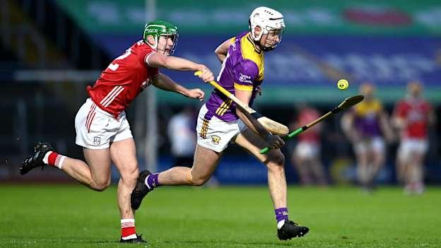 Rory O'Connor, Wexford, and Brian Roche, Cork, in Allianz Hurling League action.  Photo by Tom Beary/Sportsfile