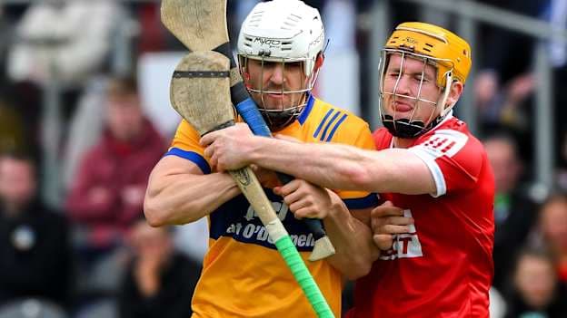 Aidan McCarthy of Clare is tackled by Declan Dalton of Cork during the Munster GAA Hurling Senior Championship Round 2 match between Cork and Clare at SuperValu Páirc Ui Chaoimh in Cork. Photo by Ray McManus/Sportsfile.