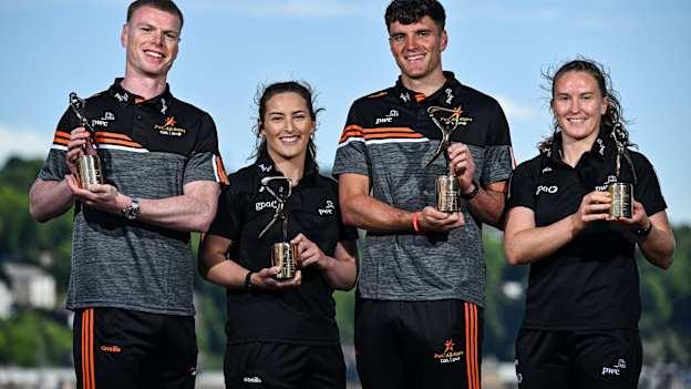 PwC GAA/GPA Player of the Month for April Cork hurler Brian Hayes, Meath footballer Mathew Costello, left, and PwC GPA Women Players of the Month for April, Kerry ladies footballer Síofra O’Shea, right, and Offaly camogie player Mairéad Teehan with their awards at PwC offices in Cork. Photo by David Fitzgerald/Sportsfile