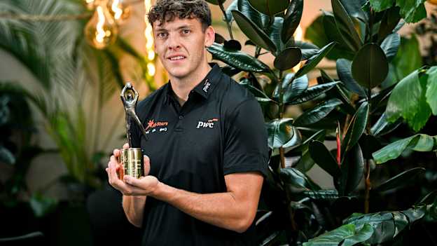 PwC GAA/GPA Player of the Month for July in football, David Clifford of Kerry, with his award at PwC offices in Dublin. Photo by Ramsey Cardy/Sportsfile.