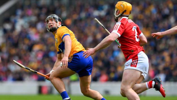 David Reidy, Clare, and Niall O' Leary, Cork, in Munster SHC action. Photo by Ray McManus/Sportsfile