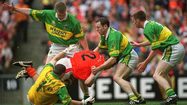 Oisin McConville, Armagh, is tackled by Kerry goalkeeper Declan O'Keeffe, Tomas Ó Sé, Séamus Moynihan, and Marc Ó Sé, during the 2002 All-Ireland SFC Final at Croke Park. Photo by David Maher/Sportsfile