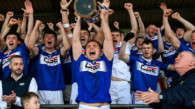 Aaron Amond captain of Old Leighlin lifts the cup with his team-mates after the Carlow County Senior Club Football Championship final match between Rathvilly and Old Leighlin at Netwatch Cullen Park in Carlow. Photo by Matt Browne/Sportsfile