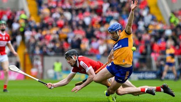 Shane O'Donnell of Clare is tackled by Eoin Downey of Cork during the Munster GAA Hurling Senior Championship Round 2 match between Cork and Clare at SuperValu Páirc Ui Chaoimh in Cork. Photo by Ray McManus/Sportsfile.