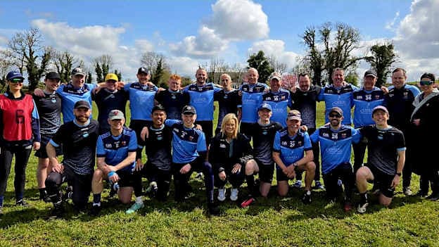 Kilmore and Dublin Mets Intermediate teams with GAA Rounders President Paula Doherty.