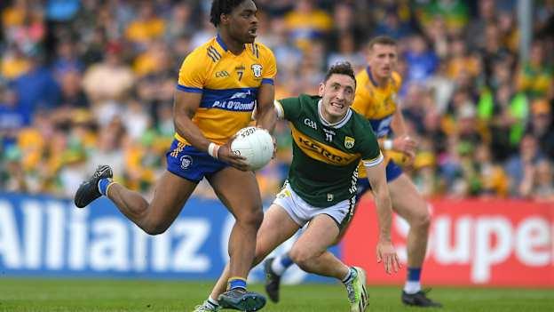 Ikem Ugweru of Clare in action against Paudie Clifford of Kerry during the 2024 Munster GAA Football Senior Championship final match between Kerry and Clare at Cusack Park in Ennis, Clare. Photo by John Sheridan/Sportsfile.